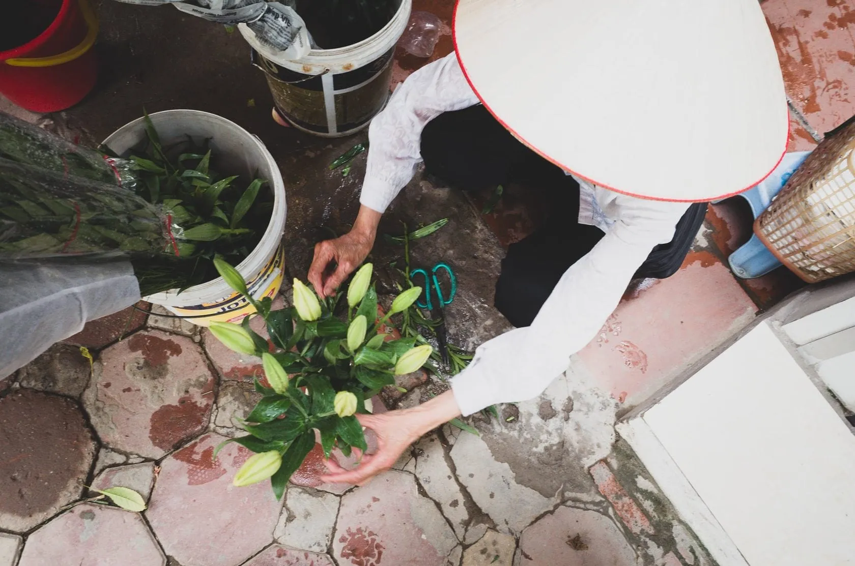 Hanoi street scene with scissors